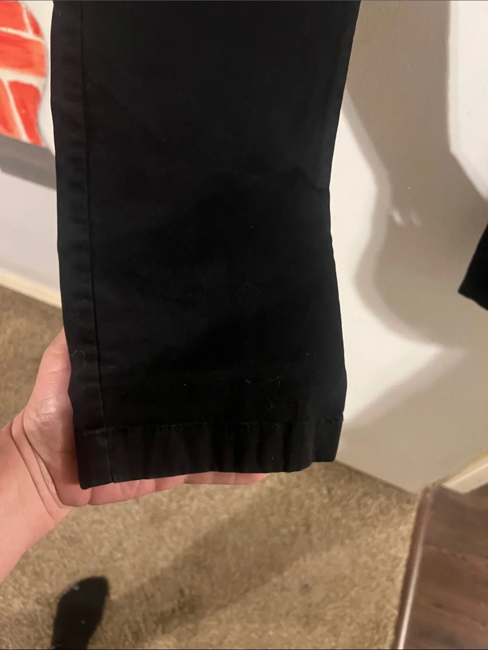 J. Crew black chinos.  Flat front